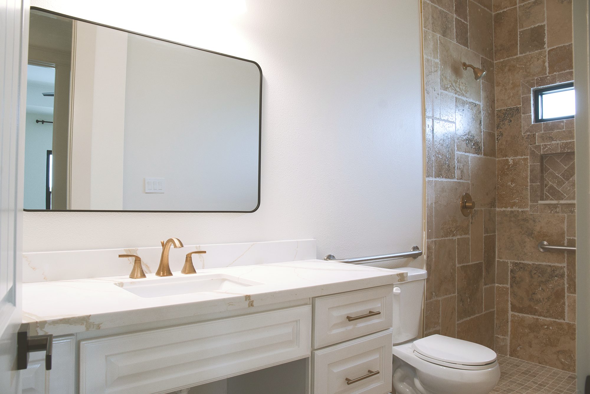 Bathroom vanity at Needville Cottage assisted living in Needville, TX